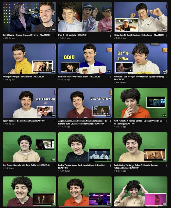 A YouTube channel screenshot displaying a grid of video thumbnails, mostly featuring reaction videos with Spanish titles involving artists like Nicky Jam, Daddy Yankee, Arcangel, Romeo Santos, and others, with views ranging from around 1.4K to 21K.