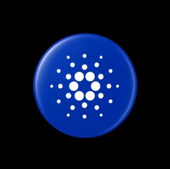 The Cardano (ADA) cryptocurrency logo displayed as a blue circular badge with white dots arranged in a geometric network pattern.
