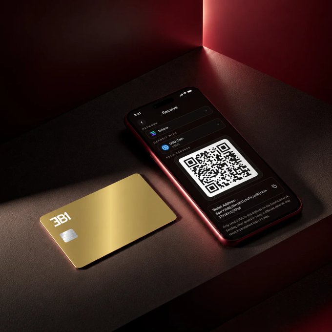 A gold '3BI' branded credit/debit card sits next to a smartphone displaying a 'Receive' cryptocurrency wallet screen with a QR code for USD Coin (USDC) on the Solana network.