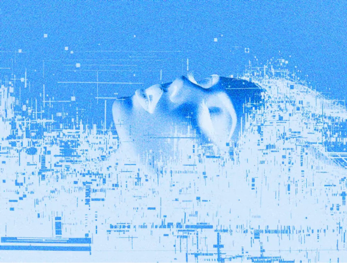 The image features a blue face with white dots, which appears to be a digital art piece or an illustration of a person's face. The background consists of a grid-like pattern that gives the impression of a city skyline at night. The caption below the image reads "Gm Wednesday" and "Drift State", possibly indicating the time or location where this artwork was created, while the phrase "Open Edition" suggests it is available for viewing and sharing on social media platforms.