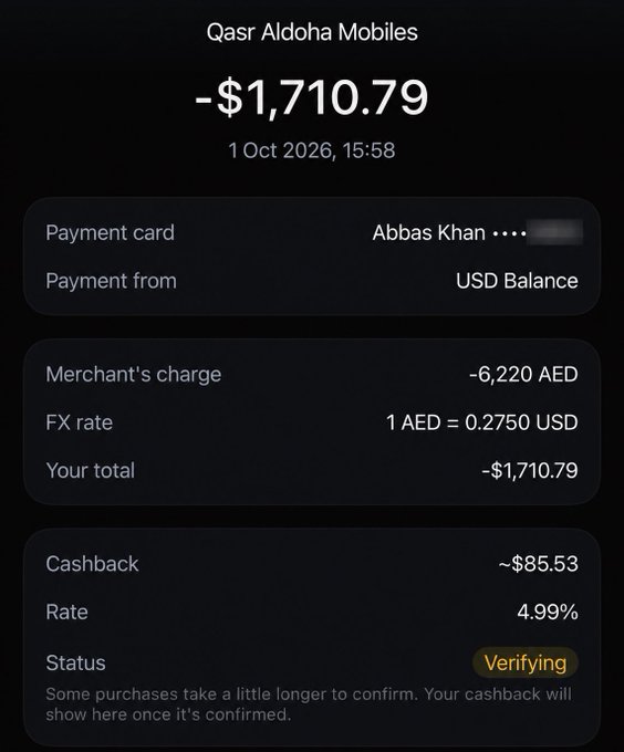 A screenshot of a digital payment receipt from Qasr Aldoha Mobiles showing a charge of -$1,710.79 dated 1 Oct 2026, with details including a merchant's charge of -6,220 AED, an FX rate of 1 AED = 0.2750 USD, and a cashback rate of 4.99% currently in 'Verifying' status.