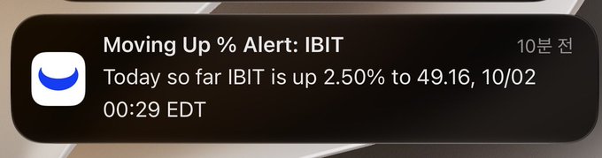 A stock notification alert from the past 10 minutes displays a "Moving Up % Alert" for ticker IBIT, reporting it is up 2.50% to $49.16 as of 10/02 at 00:29 EDT. The image accompanies a post celebrating IBIT nearing $50, with the alert supporting the bullish price action amid news that Congress is reviewing allowing banks and credit unions to hold crypto and issue stablecoins.