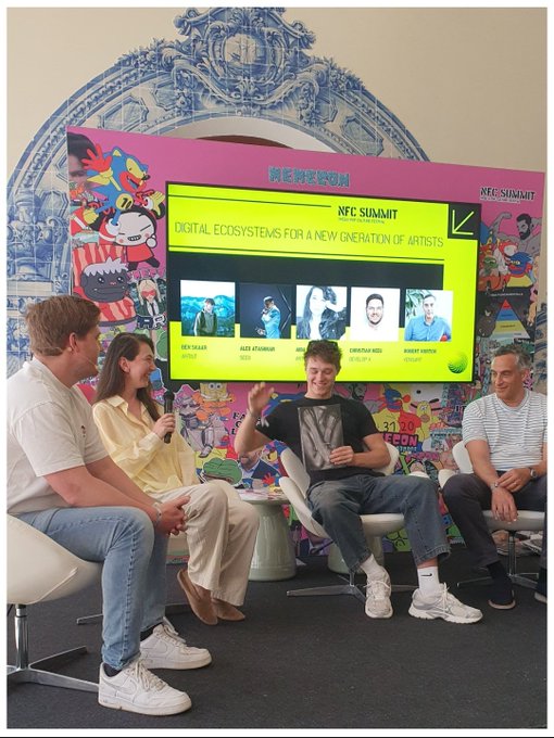 Photo from the 'NFC Summit' panel discussion titled 'Digital Ecosystems for a New Generation of Artists,' featuring speakers including Ben Drabs, Ade Atann, Christian Wei, and Povet Victor.