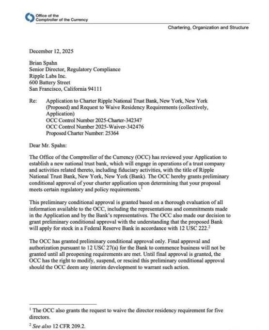 The image shows an envelope with a letter written on it addressed to Ripple, which has been approved by the U.S. banking system. The letter contains information about Ripple's status as a federally regulated U.S. trust bank, and it is sealed with a stamp. The text in the letter indicates that Ripple will become a part of the U.S. banking system once all requirements are met.