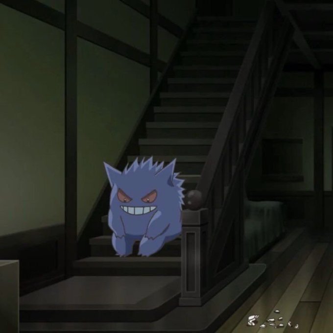 A scene from an animated show depicting a mischievous-looking purple Gengar sitting at the bottom of a wooden staircase in a dimly lit house.