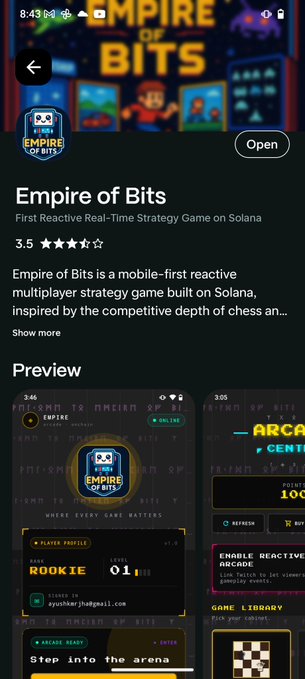 The image shows a cell phone screen displaying an app called "Empire of Bits", which appears to be a mobile game. The app has been recently released, as indicated by its open status. It features a menu bar with options for different game modes such as "First Real-Time Strategy Game" and "Solo". There are also several other games available on the app store.