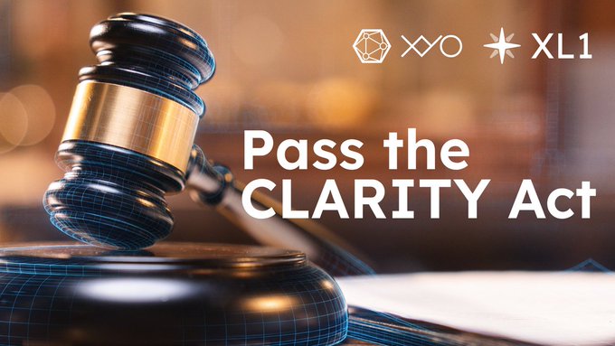 A wooden gavel rests on a courtroom surface against a blurred background, overlaid with the text "Pass the CLARITY Act" and the XYO and XL1 logos. The image visually reinforces the post's call to action for the CLARITY Act, using legal imagery to emphasize the legislative and regulatory nature of the appeal.