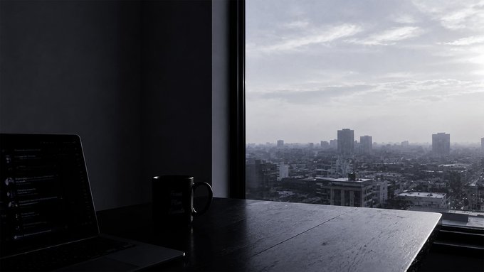 A dimly silhouetted laptop and mug sit on a desk beside a large window overlooking a hazy city skyline at dawn, capturing a quiet "gm frens" morning moment before the Friday grind begins.

The dark, screen-lit workspace pairs naturally with the post's motivational message, as the early cityscape evokes the stillness of starting a new day ready to "keep farming" and "get it."