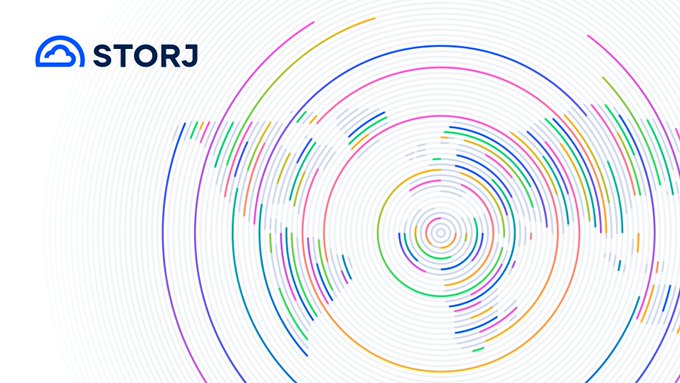 The image features the "STORJ" logo alongside a vibrant visualization of concentric, fragmented circular rings in various colors against a white background, visually representing the distribution of encrypted file pieces across a global network as described in the accompanying text.