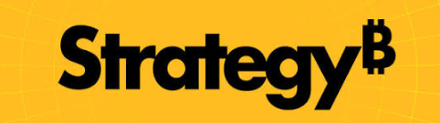 The image displays the bold black "Strategy" logo on a yellow background, with the company's signature Bitcoin "₿" symbol incorporated into the "y" of the logo. The logo relates to the post by representing Strategy (formerly MicroStrategy), the company being discussed for its unusual pause on Bitcoin purchases and its $175 million STRC share buyback initiative.