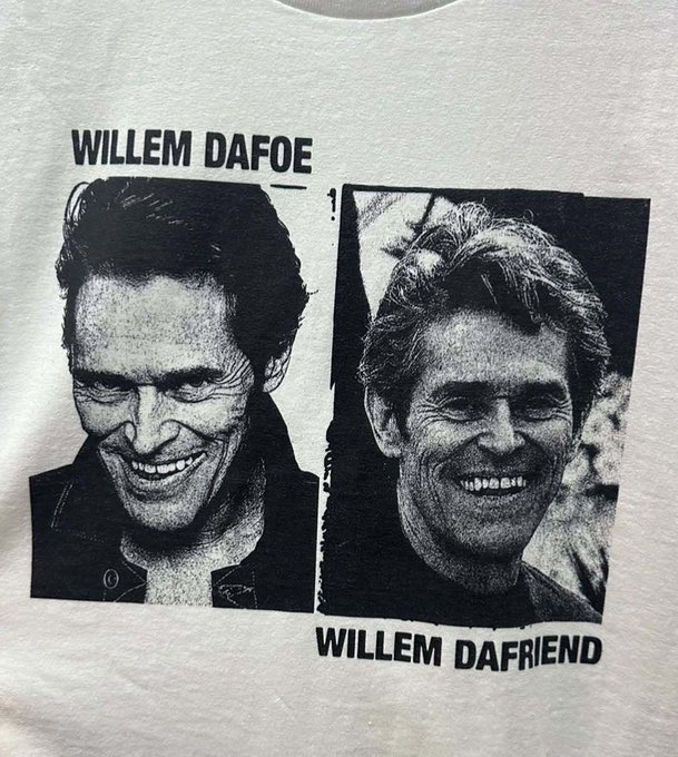 A white t-shirt featuring black-and-white photos of actor Willem Dafoe smiling, with the text 'WILLEM DAFOE' above one image and a humorous misspelling 'WILLEM DAFRIEND' below the other.