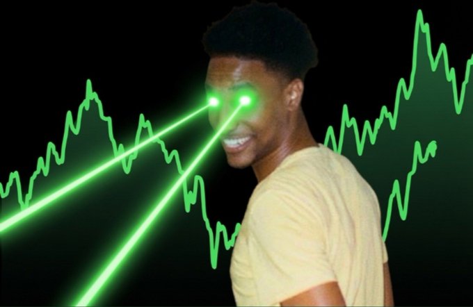 A young man smiles with glowing green laser beams shooting from his eyes against a backdrop of green stock market charts, humorously reflecting on the sudden silence around the $ANSEM ticker after a period of intense activity.