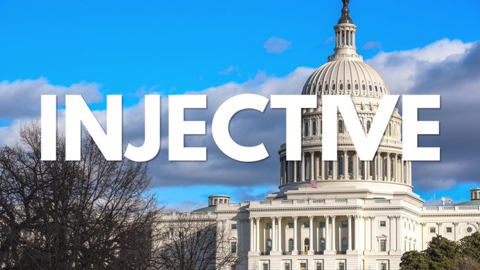 A thumbnail or title card showing the U.S. Capitol building with the bold white text "INJECTIVE" overlaid across the center against a blue sky with clouds.