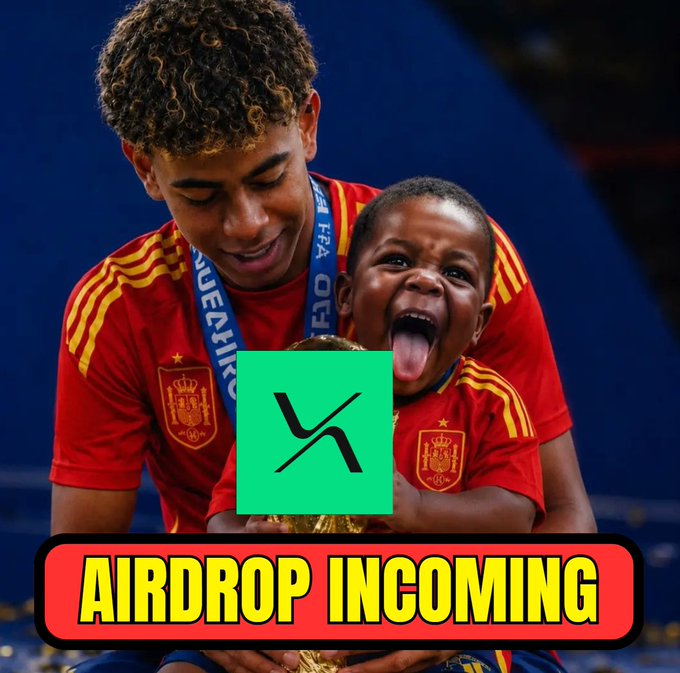 Two young soccer players in Spain jerseys celebrate with the World Cup trophy, overlaid with a green XRP logo and the text 'AIRDROP INCOMING'.