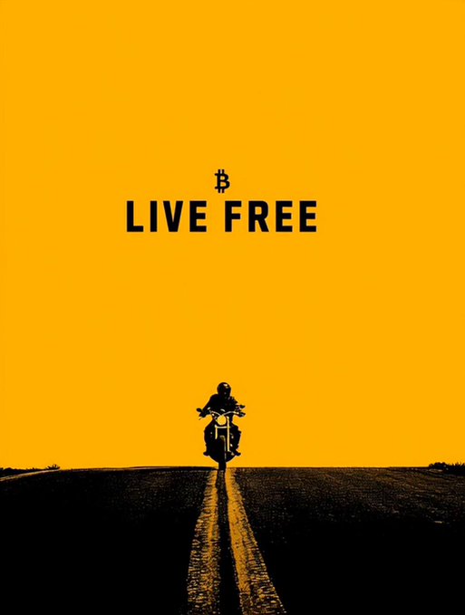 A silhouetted motorcyclist rides down a long, empty road against a vibrant yellow sky, with the text "LIVE FREE" and a Bitcoin (₿) symbol displayed above, symbolizing the freedom and independence associated with cryptocurrency.