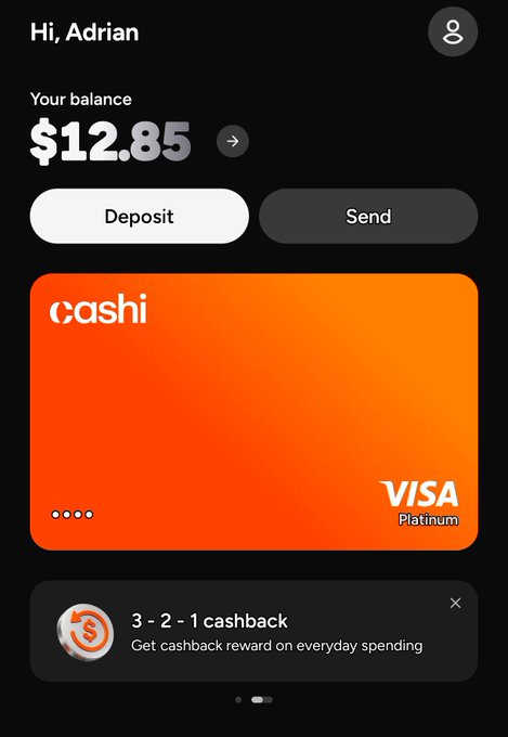A screenshot of the Cashi app dashboard for user Adrian shows a balance of $12.85 with Deposit and Send options, along with an orange Cash Visa Platinum card and a "3-2-1 cashback" promotion banner at the bottom. The post highlights that the user signed up for Cashi right after its launch on the 11th, with the screenshot demonstrating their new account balance and welcome cashback offer.