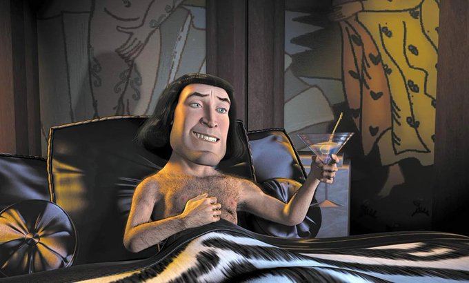 A 3D-animated character with long dark hair lounges shirtless on a bed, holding a martini glass with a slight smile.