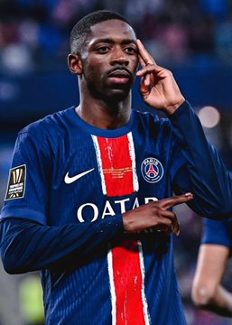 A PSG player in the team's blue jersey with "QATAR" sponsorship text is seen gesturing with his finger to his temple, fitting the context of a betting prediction on PSG to win the Super Cup. The image aligns with the breaking news about a $320k wager placed on PSG via Polymarket.