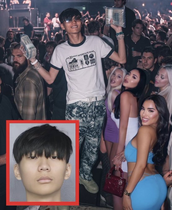 A young man holding stacks of cash surrounded by women at a nightclub, with an inset photo of his face in the lower left corner.