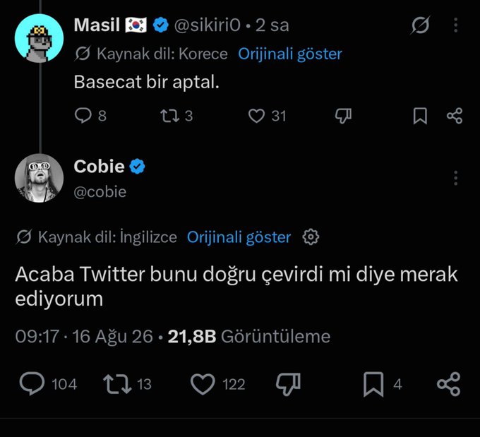 A Turkish-translated screenshot of a tweet exchange between @sikiri0 ("Basecat bir aptal" — Basecat is a fool) and @cobie ("Acaba Twitter bunu doğru çevirdi mi diye merak ediyorum" — I wonder if Twitter translated this correctly), with Cobie's original English tweet receiving 21.8B views, illustrating the viral spread referenced in the post's note about Cobie's comment inspiring widespread meme content.