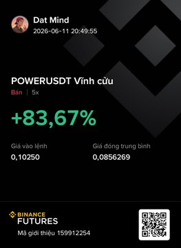 The image features a black card with information about PowerusdVinh, which is a cryptocurrency exchange from BinanceFutures. The card includes details such as the current value of the currency, along with a screenshot of an Ethereum smart contract, and some text written in another language or in a foreign tongue. The main focus of this image seems to be the PowerusdVinh card itself, rather than any specific content on it.