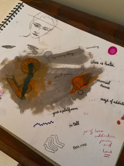 An image of a sketchbook page featuring abstract artwork with watercolor washes, a face drawing, and handwritten notes including phrases like "big screaming clown," "short forever," "laumeching," "Where's Hunter," "universal themes," "mage of addicti[on]," and "to tell." The sketchbook page appears to illustrate the caption's reference to Hunter Biden's artwork, depicting a smear that resembles feces alongside mock-investment notation ("461," "500,000") referencing the $HAWK meme coin scandal where buyers lost money while funds allegedly went to support his art activities.