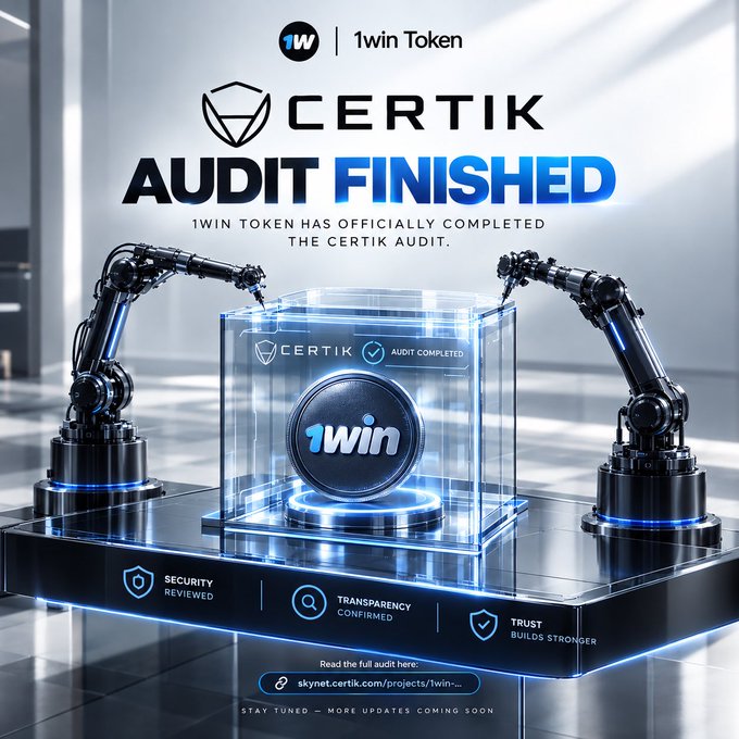 A promotional graphic announces that 1win Token has officially completed its CertiK audit, following its successful Halborn Security review, with the futuristic image featuring the 1win and CertiK logos alongside a glowing "Audit Completed" display and labels highlighting "Security Reviewed," "Transparency Confirmed," and "Trust Builds Stronger."