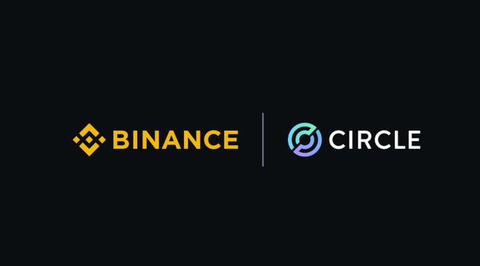 The image displays the Binance and Circle logos side by side on a black background, visually representing the new strategic partnership in which Binance invested $100 million into Circle to expand USDC globally under a 5-year agreement.