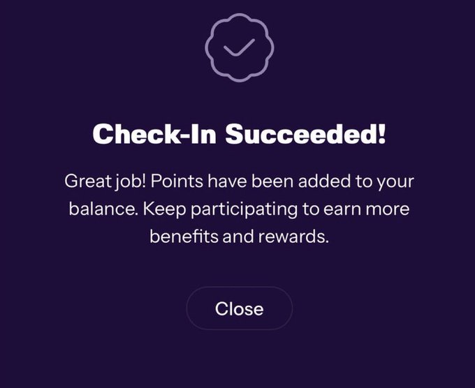 A 'Check-In Succeeded!' confirmation screen on a dark purple background with a checkmark badge and a 'Close' button.