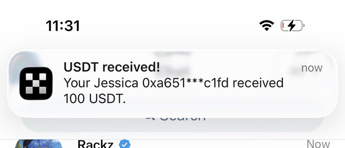 An iOS notification from an app showing 'USDT received! Your Jessica 0xa651***c1fd received 100 USDT.' at 11:31.