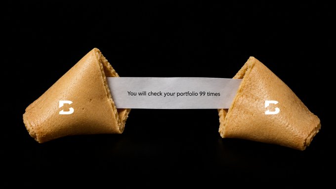 Two fortune cookies are pulled apart to reveal a paper slip reading "You will check your portfolio 99 times," playing on the classic "fortune inside" trope to humorously predict obsessive investment monitoring.