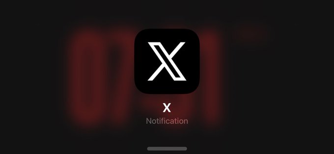 A dark smartphone notification screen displaying the X (formerly Twitter) logo with the text 'X Notification' underneath.
