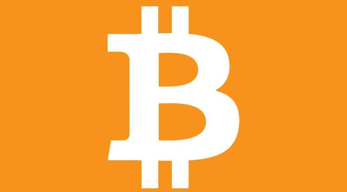 The image features the Bitcoin ($BTC) logo—a stylized white "B" with two vertical strokes—displayed prominently on an orange background. It visually represents the Bitcoin price movement referenced in the post, which notes $BTC fell 1.1% to $65,537 amid continued positive inflows into spot bitcoin ETFs.