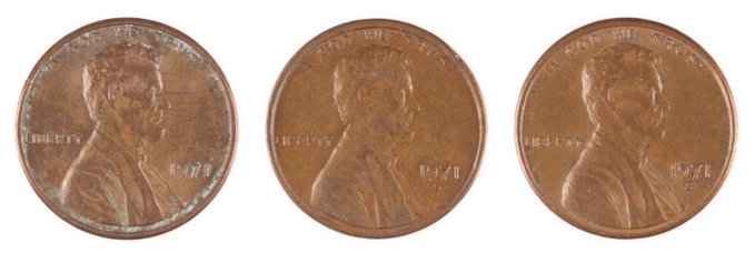 Three U.S. Lincoln pennies showing the obverse side, displaying increasing wear and oxidation from left (cleaner) to right (more tarnished).