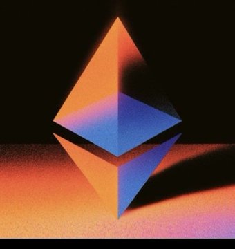 The image features a large, colorful, triangular-shaped object with two sides that are orange and one side that is blue. The object has a pyramid shape at its center, which stands out against the black background of the photo. The text "ETH" can be seen in the image as well.