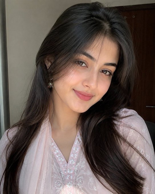 A young woman with long dark hair, wearing a light pink floral-embroidered top and traditional jhumka earrings, smiles softly at the camera in what appears to be a selfie.

The image doesn't appear to have any direct connection to the accompanying post about sleep tracking, wellness apps, or the $SLEEP token and gsleep platform. It looks like a personal selfie that may have been mistakenly paired with the caption, as there are no visual elements relating to sleep apps, technology, or wellness metrics visible in the photo.