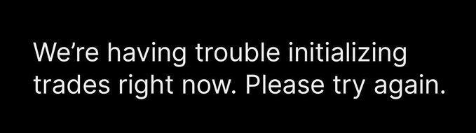A black screen with white text that reads, 'We're having trouble initializing trades right now. Please try again.'
