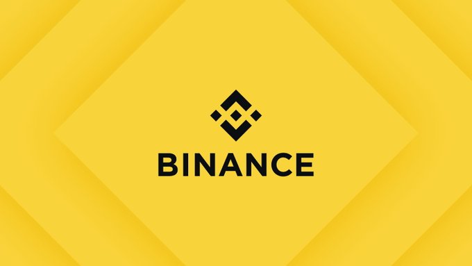 The Binance cryptocurrency exchange logo, featuring its distinctive geometric diamond icon and the text 'BINANCE' in black on a yellow background.