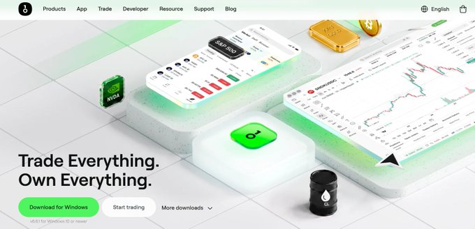 A website banner for a trading platform with the headline "Trade Everything. Own Everything." featuring buttons to "Download for Windows," "Start trading," and "More downloads," alongside images of trading interfaces and commodities like gold and oil.