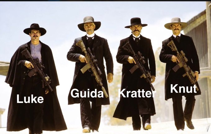 A meme image of four Western gunfighters in black coats labeled 'Luke', 'Guida', 'Kratter', and 'Knut'.