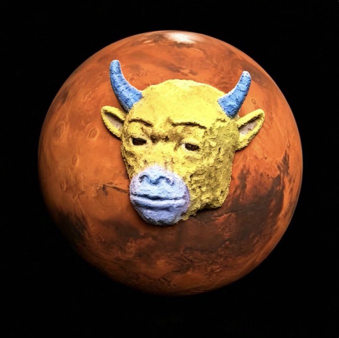 The image shows a yellow bull's head with blue horns emerging from a reddish-orange planet (resembling Mars), visually representing the "牛来" (Niu Lai) concept—Chinese for "bull coming"—a memecoin the poster is hyping as heavily undervalued, symbolizing the bullish momentum arriving.