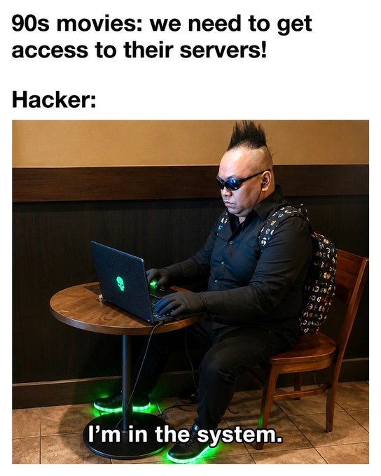 A meme captioned '90s movies: we need to get access to their servers! Hacker:' showing a man with a mohawk typing on a glowing green laptop, with the caption 'I'm in the system.'