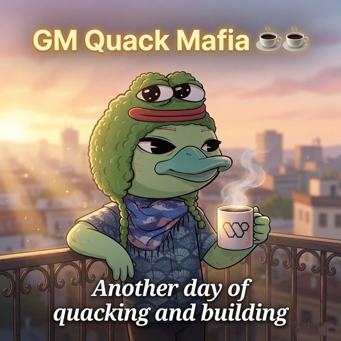 The image features a cartoon frog wearing a hat, holding a cup of coffee while standing on a balcony overlooking a cityscape. The caption below the image reads "Another day of quacking and building", which could be interpreted as a humorous reference to the Quackkk meme or a playful way of expressing the idea that the frog is multitasking between quacking and building.