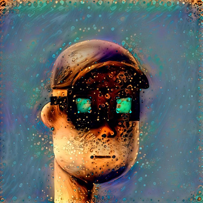 A surreal, psychedelic digital artwork featuring a stylized human head with large reflective sunglasses, surrounded by swirling blue and gold patterns with bubble-like textures.