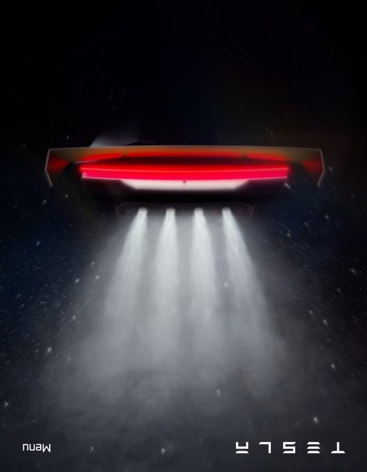 Dark cinematic image showing a futuristic vehicle's rear with a glowing red taillight bar and four bright headlight beams illuminating dust particles. Text reads 'TESLA' and 'MANU' in the bottom corners.