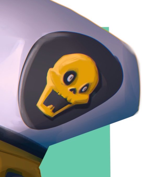 A stylized yellow skull logo with hollow eyes displayed within a dark mechanical housing.