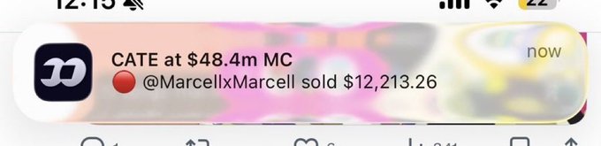A mobile push notification from the DexScreener app shows that user @MarcellxMarcell sold $12,213.26 worth of $CATE at a $48.4m market cap, suggesting the crypto influencer exited his position during CATE's sharp decline.