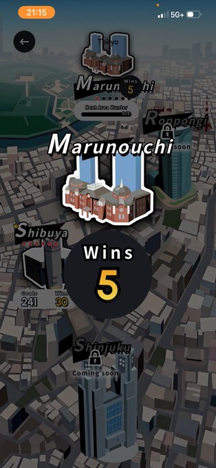 3D map-style game screen highlighting Tokyo's Marunouchi district as a winning territory with 5 wins, surrounded by Shibuya and other locked areas marked 'Coming soon'.