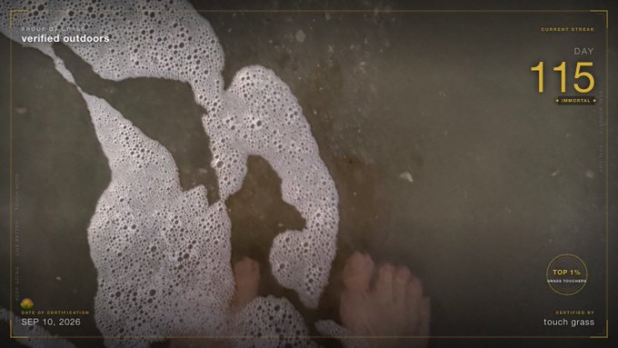 Bare feet standing in soapy water, styled as a stream overlay with text 'verified outdoors', 'DAY 115', and 'TOUCH GRASS' dated SEP 10, 2026.