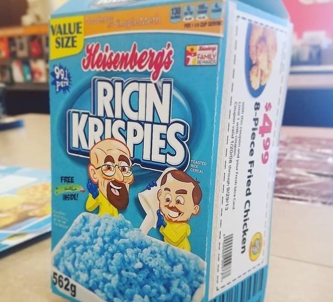 A parody cereal box labeled "Heisenberg's RICIN KRISPIES" featuring cartoon characters resembling Walter White and Jesse Pinkman from Breaking Bad, with text reading "8-Piece Fried Chicken" and "99¢ per box."